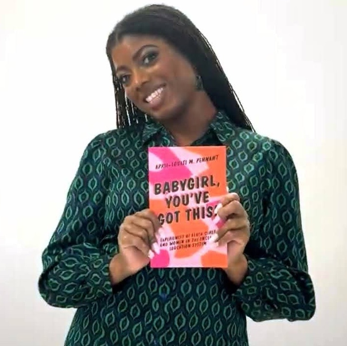Dr April-Louise Pennant with book